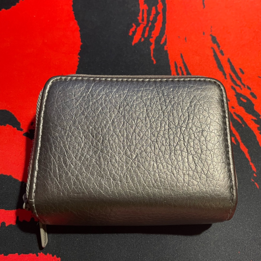 Small silver zipper wallet
